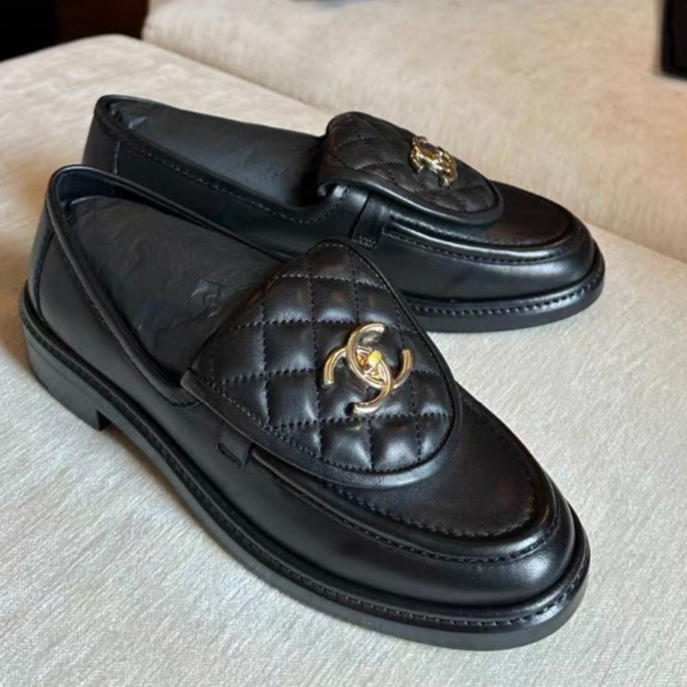 CHANEL Black Quilted Leather Loafers with Gold CC Accent